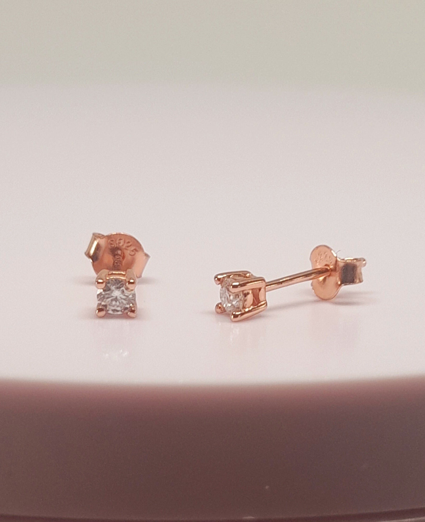 0.2 Ctw Lab Grown VVS1 Moissanite 14 K Rose Gold Plated Silver Solitaire Earrings Stud