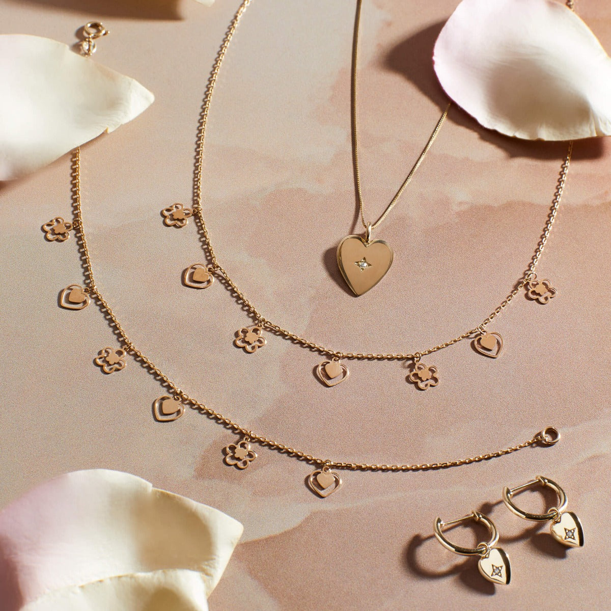 Elements Gold Heart and Flower Charm Bracelet 9 Ct Yellow Gold